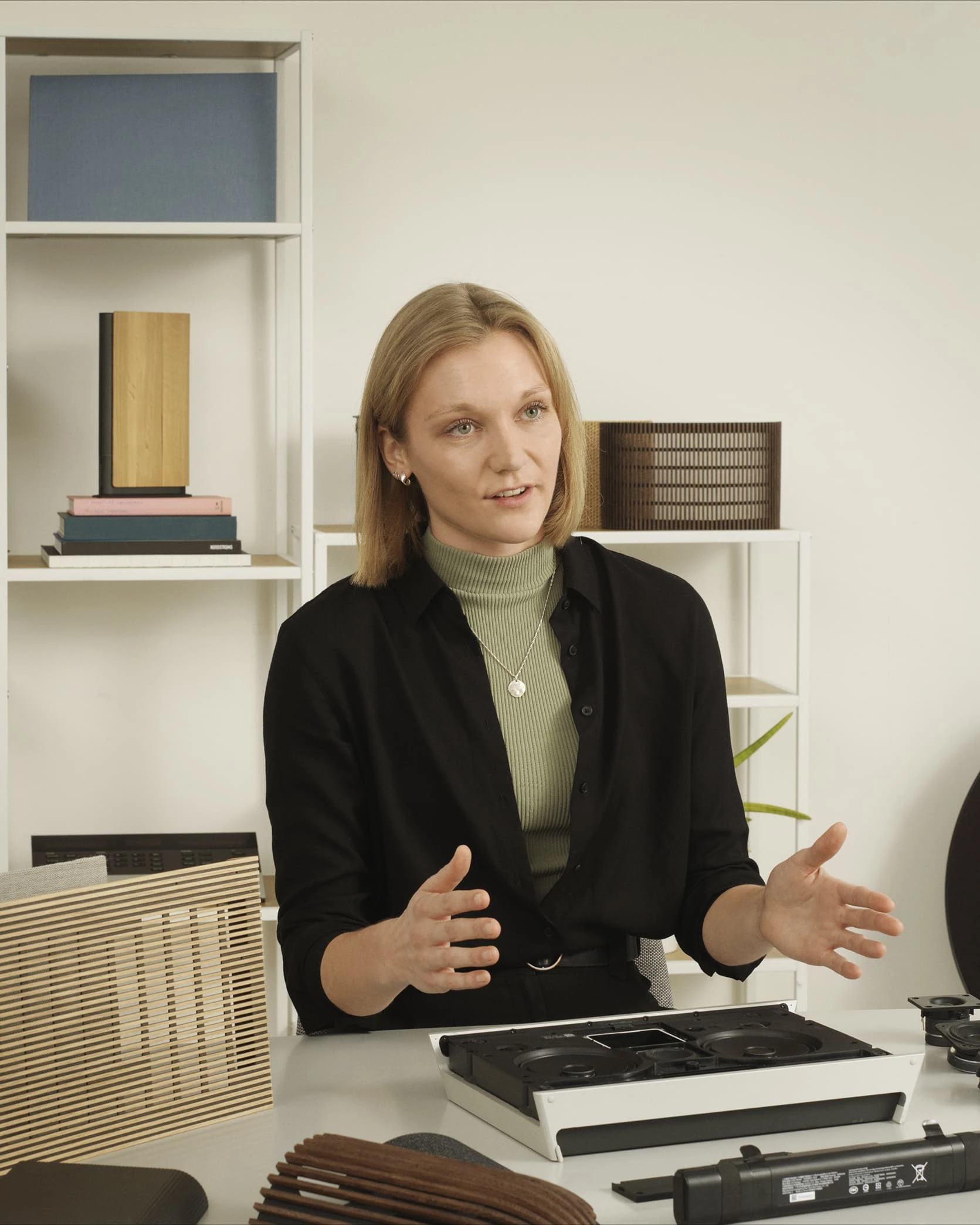 Berit sitting with the Beosound Level