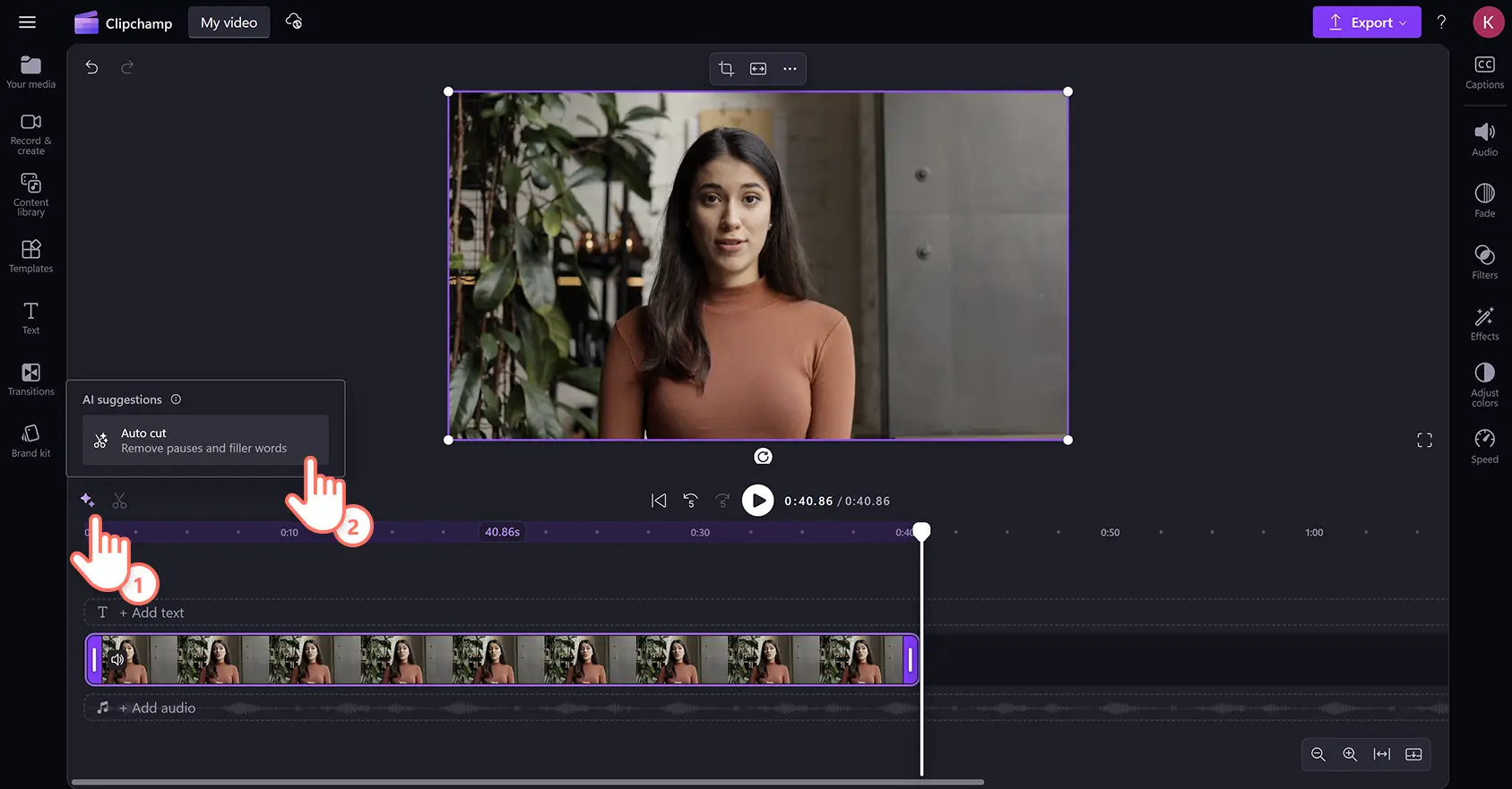 A user clicking on the sparkle icon and auto cut button in Clipchamp video editor. 