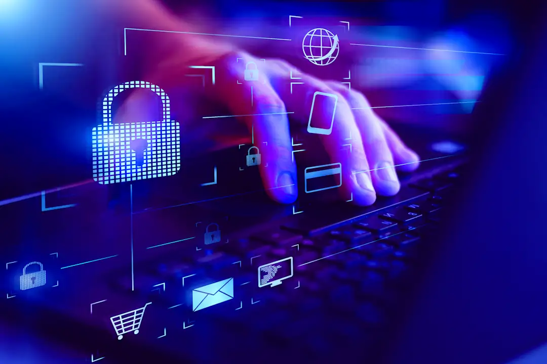 Hand typing in password on a laptop for digital authentication conceptual image