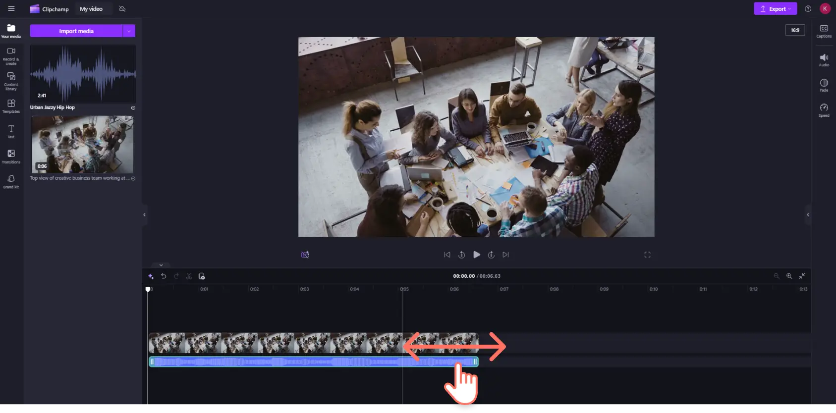 A user trimming a royalty-free music audio clip in the timeline in Clipchamp.