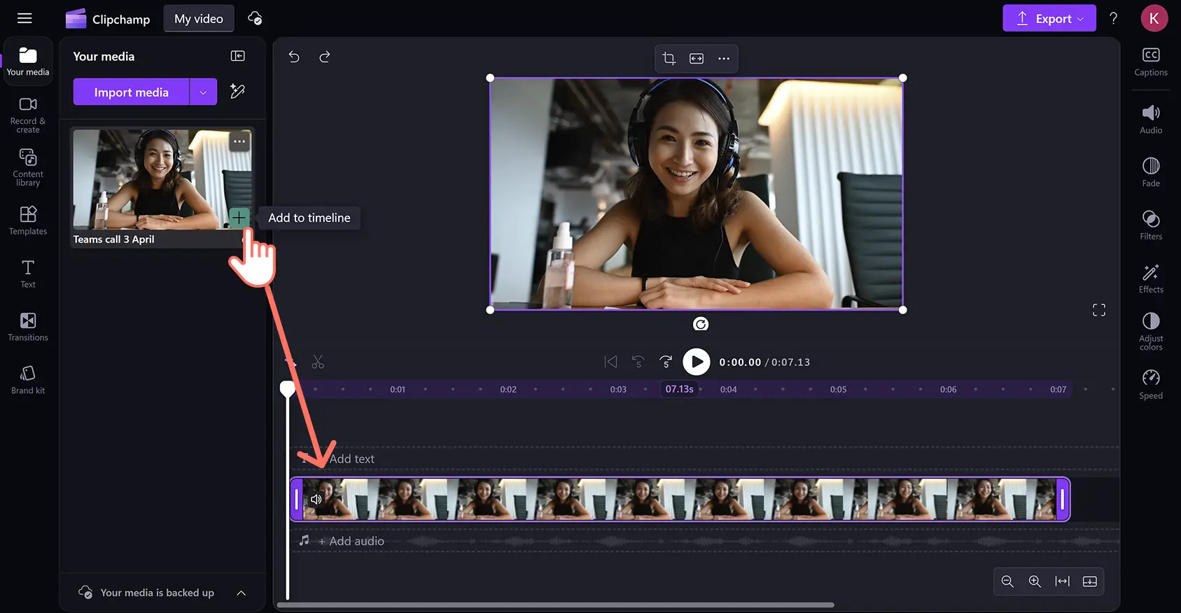 A user dragging and dropping a video asset onto the timeline in Clipchamp video editor.