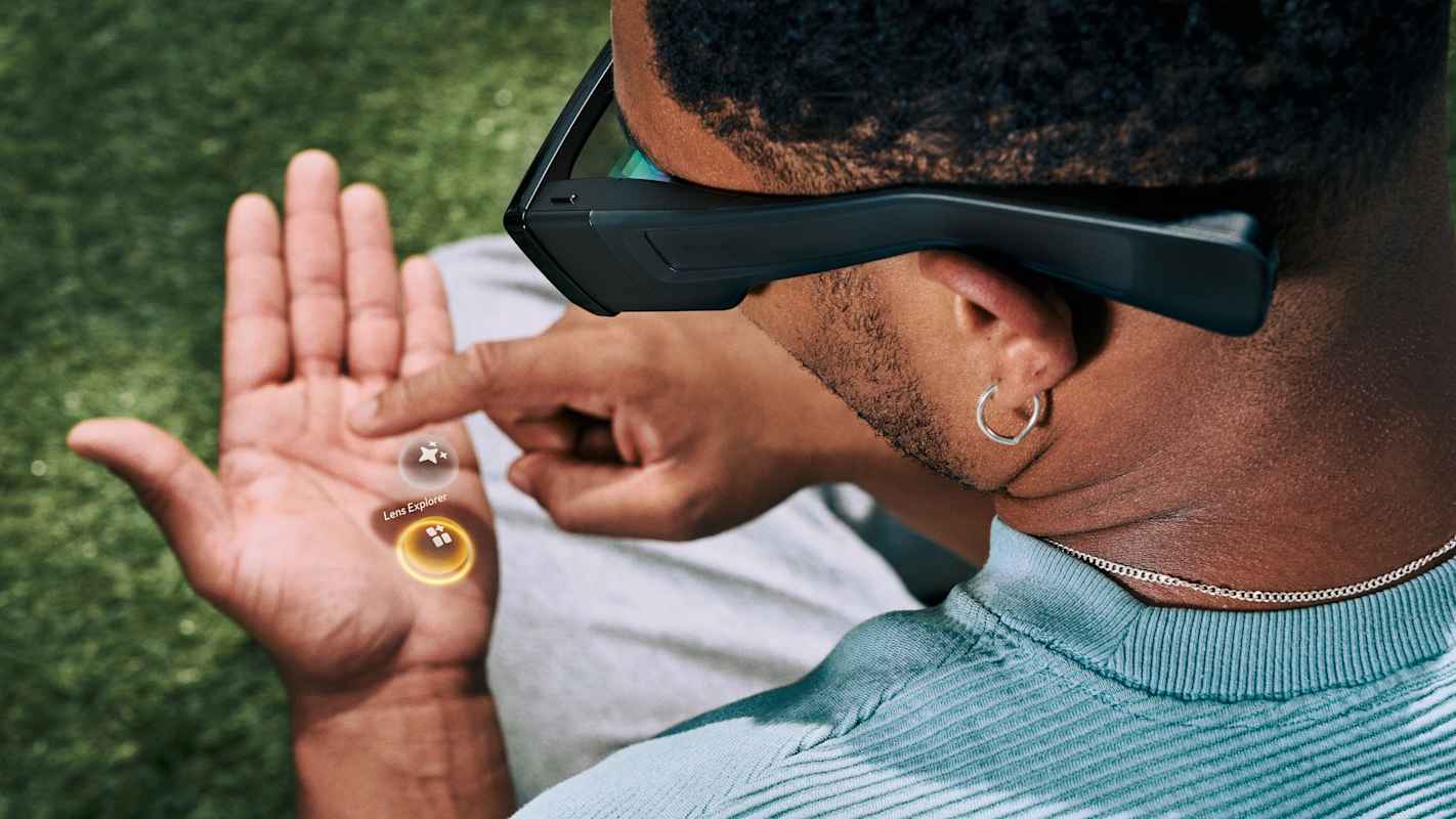 Person with Snap OS on hand.
