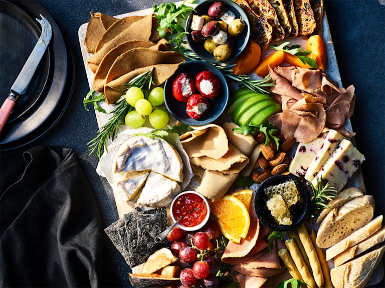 A grazing platter with a selection of Quorn vegan deli meats and other foods.